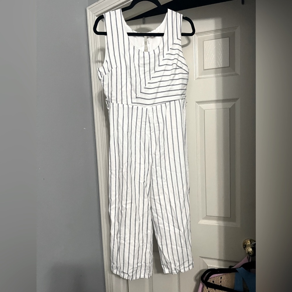 White jumpsuit with navy stripes- open back- size large